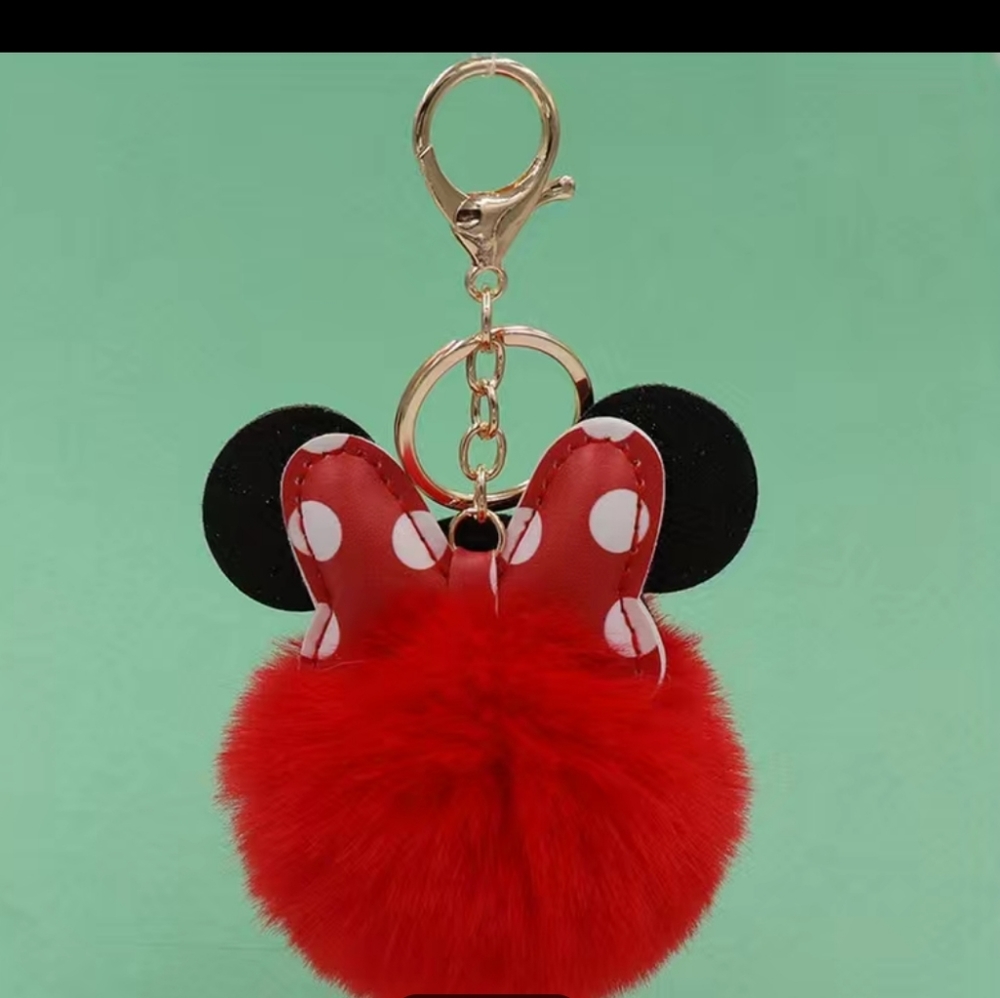 NWT Minnie Mouse fluffy pom pom bag charm, red polka dot bow